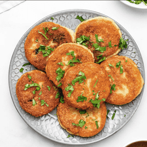 Samosa,Deep fried crispy flour snack with savoury filling of spiced potatoes, onions and peas